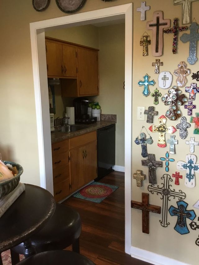 Kitchen in Unit 207 with wood cabinets and appliances — furniture and decor not included